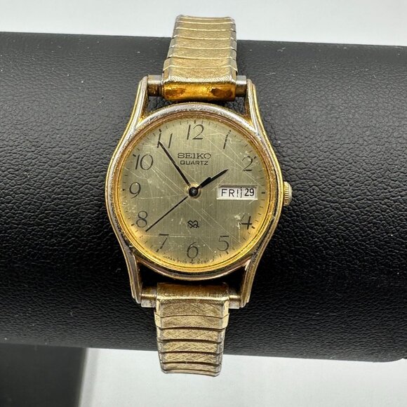 Vintage Seiko Watch Women Gold Tone Day Date Window Stretch Band Working 6.5" - Picture 1 of 11